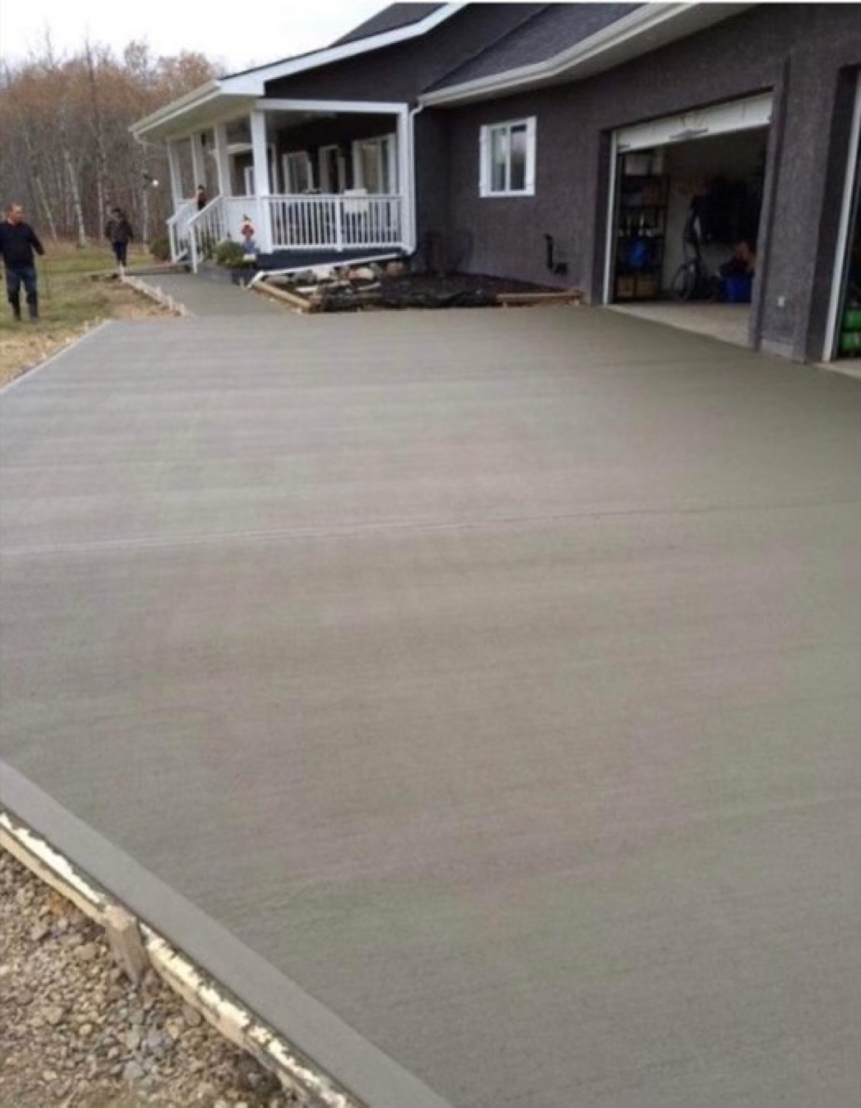 Freshly poured concrete driveway at a Pickering area home